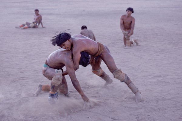Michael Friedel "The Mehinaku tribe. Village square. The wrestling-contest, known as Huka-Huka, lies